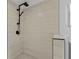 Modern shower with a rainfall shower head and stylish tile work at 267 Camrose St, Port Charlotte, FL 33954