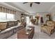 Spacious living room with tile flooring, natural light, and an open floor plan at 3322 Purple Martin Dr # 127, Punta Gorda, FL 33950