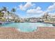 Community pool with ample space to lounge in the sun at 3322 Purple Martin Dr # 127, Punta Gorda, FL 33950
