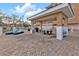 Community pool area features a cabana with seating and BBQ, with pool lounge chairs at 3322 Purple Martin Dr # 127, Punta Gorda, FL 33950