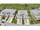 Aerial view showcasing the community's well-maintained townhomes and manicured green spaces at 3393 Grand Vista Ct # 101, Port Charlotte, FL 33953