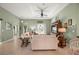 Bright living room with neutral tones, tray ceiling, and abundant natural light at 380 Concordia St, Punta Gorda, FL 33983