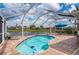 Inviting screened-in pool area with a beautiful waterfront view, perfect for relaxing at 380 Concordia St, Punta Gorda, FL 33983