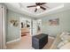 Inviting sitting room with tray ceiling, neutral palette, and tile floors throughout at 380 Concordia St, Punta Gorda, FL 33983