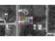This aerial captures a well-situated property nestled amongst mature trees in a quiet residential neighborhood at 4373 Atwater Dr, North Port, FL 34288