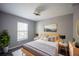 Cozy bedroom features wood floors, neutral walls, and natural light for a warm, inviting space at 4373 Atwater Dr, North Port, FL 34288