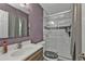 Bathroom with sleek glass-enclosed shower and modern vanity at 628 Tarpon Way, Punta Gorda, FL 33950