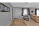 Bright living room showcasing a neutral color palette and comfortable seating arrangements at 628 Tarpon Way, Punta Gorda, FL 33950