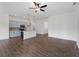 Open-concept living room and kitchen with modern finishes and plenty of natural light at 12156 Wellington Ave, Port Charlotte, FL 33981