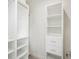 Organized walk-in closet with custom shelving and drawers for ample storage at 14319 Allensworth Ave, Port Charlotte, FL 33981