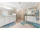Bright bathroom features white cabinets, granite counters and walk-in shower at 14640 Sycamore Ct # 2812, Punta Gorda, FL 33955