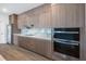 Gourmet kitchen featuring stainless steel appliances, ample countertop space, and stylish wood cabinets at 16440 Cape Horn Blvd, Punta Gorda, FL 33955