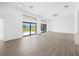 Bright and spacious living room with sliding glass doors that let in plenty of natural light at 16440 Cape Horn Blvd, Punta Gorda, FL 33955