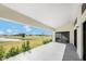 Spacious covered patio overlooking a well manicured back yard at 16440 Cape Horn Blvd, Punta Gorda, FL 33955