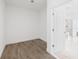 Spacious walk-in closet with tile floors and access to the main bathroom at 16440 Cape Horn Blvd, Punta Gorda, FL 33955
