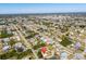 Aerial view of the property in a mature residential neighborhood with easy access to amenities at 209 Seminole Nw Blvd, Port Charlotte, FL 33952