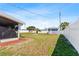 Spacious backyard featuring a detached shed at 209 Seminole Nw Blvd, Port Charlotte, FL 33952