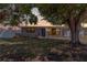 Charming single-story home with well-kept front yard landscaping at 209 Seminole Nw Blvd, Port Charlotte, FL 33952