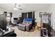 Comfortable Living room offers an expansive area with natural light and a home office space at 209 Seminole Nw Blvd, Port Charlotte, FL 33952