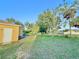 Spacious backyard with mature trees offers tranquility at 22299 Catherine Ave, Port Charlotte, FL 33952