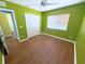 Bright bedroom with hardwood floors, closet, and large window at 22299 Catherine Ave, Port Charlotte, FL 33952