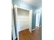 Open closet with shelving, and wood-look floors at 22299 Catherine Ave, Port Charlotte, FL 33952