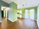 Open view of kitchen and dining area with sliding glass door at 22299 Catherine Ave, Port Charlotte, FL 33952