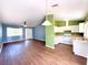 Open-concept living area flowing into a bright kitchen at 22299 Catherine Ave, Port Charlotte, FL 33952