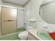 Bathroom featuring tiled shower, toilet, and vanity at 22385 Olean Blvd, Port Charlotte, FL 33952