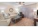 Living room with wood floors, ceiling fan, and comfortable seating at 2290 Aaron St # 312, Port Charlotte, FL 33952