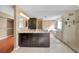 Bathroom with dark cabinets, double sinks, a glass shower and a soaking tub at 23240 Fullerton Ave, Punta Gorda, FL 33980