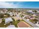 Aerial view of neighborhood shows location of home to golf, water, shopping and dining in a desirable community at 24321 Kintail Ct, Punta Gorda, FL 33980