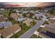 Neighborhood aerial view showcases the home's location, landscaping, and community features, plus easy access to neighborhood golf at 24321 Kintail Ct, Punta Gorda, FL 33980