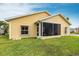 This home features a screened lanai, adding a delightful outdoor space for relaxation and enjoyment at 24321 Kintail Ct, Punta Gorda, FL 33980