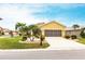 Charming single-Gathering home with a well-manicured lawn and tropical landscaping at 24321 Kintail Ct, Punta Gorda, FL 33980