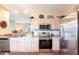 Well-equipped kitchen with modern appliances, granite countertops, and plenty of storage space at 24321 Kintail Ct, Punta Gorda, FL 33980