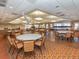 Well-lit community meeting room with ample seating for gatherings and events at 24321 Kintail Ct, Punta Gorda, FL 33980