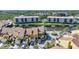 An aerial view showing homes in a waterfront community with lush landscaping and serene canal views at 25188 Marion Ave # 1015, Punta Gorda, FL 33950
