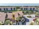 An aerial view of a beautiful home in a waterfront community with lush landscaping and serene canal views at 25188 Marion Ave # 1015, Punta Gorda, FL 33950