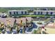Beautiful aerial view of waterfront townhomes with private boat docks and lush landscaping at 25188 Marion Ave # 1015, Punta Gorda, FL 33950