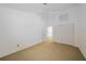 Bedroom with closet doors and an attached bathroom at 25188 Marion Ave # 1015, Punta Gorda, FL 33950
