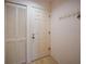 Entryway with closet and door, providing convenient storage options at 25188 Marion Ave # 1015, Punta Gorda, FL 33950