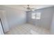 Tile floor in bedroom with a ceiling fan at 25225 Rampart Blvd # 604, Punta Gorda, FL 33983