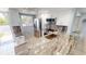 Well-designed kitchen featuring updated countertops and stainless appliances, conveniently located near the entrance at 25225 Rampart Blvd # 604, Punta Gorda, FL 33983