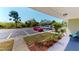Comfortable condo boasting a private parking spot and a serene view of the surrounding greenery and the adjacent property at 25225 Rampart Blvd # 604, Punta Gorda, FL 33983