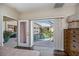 Bedroom view of screened lanai with a pool and hot tub at 26089 Templar Ln, Punta Gorda, FL 33983