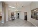 Bright dining area with a skylight, chandelier, and large window offering natural light at 26089 Templar Ln, Punta Gorda, FL 33983