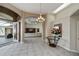 Welcoming foyer with a decorative table and a view of the open-concept living space at 26089 Templar Ln, Punta Gorda, FL 33983