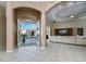 Open foyer showcasing pool views through the home's glass double doors at 26089 Templar Ln, Punta Gorda, FL 33983