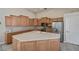 Kitchen featuring ample cabinetry, granite countertops, and stainless-steel appliances at 26089 Templar Ln, Punta Gorda, FL 33983